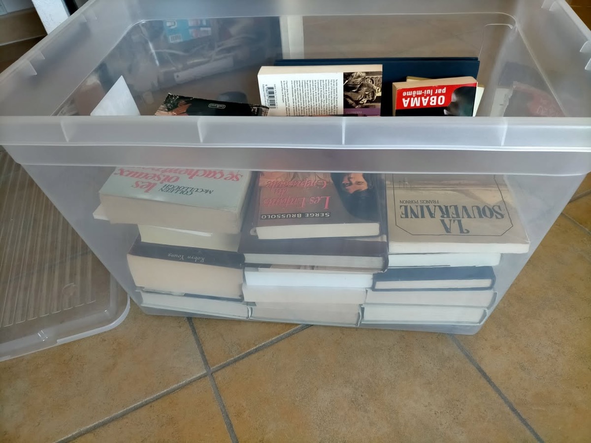 Box of books and DVDs