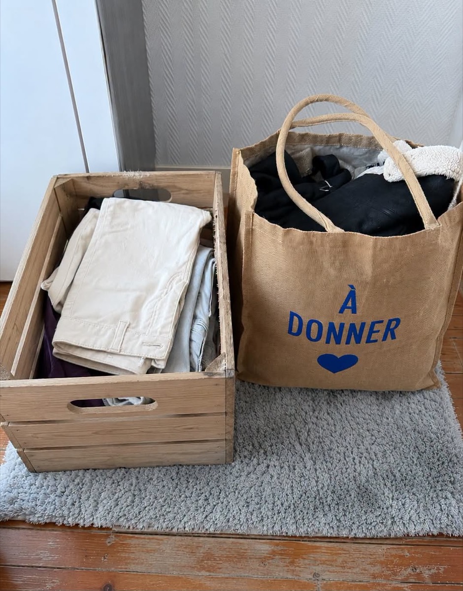 Crate of linens and clothes