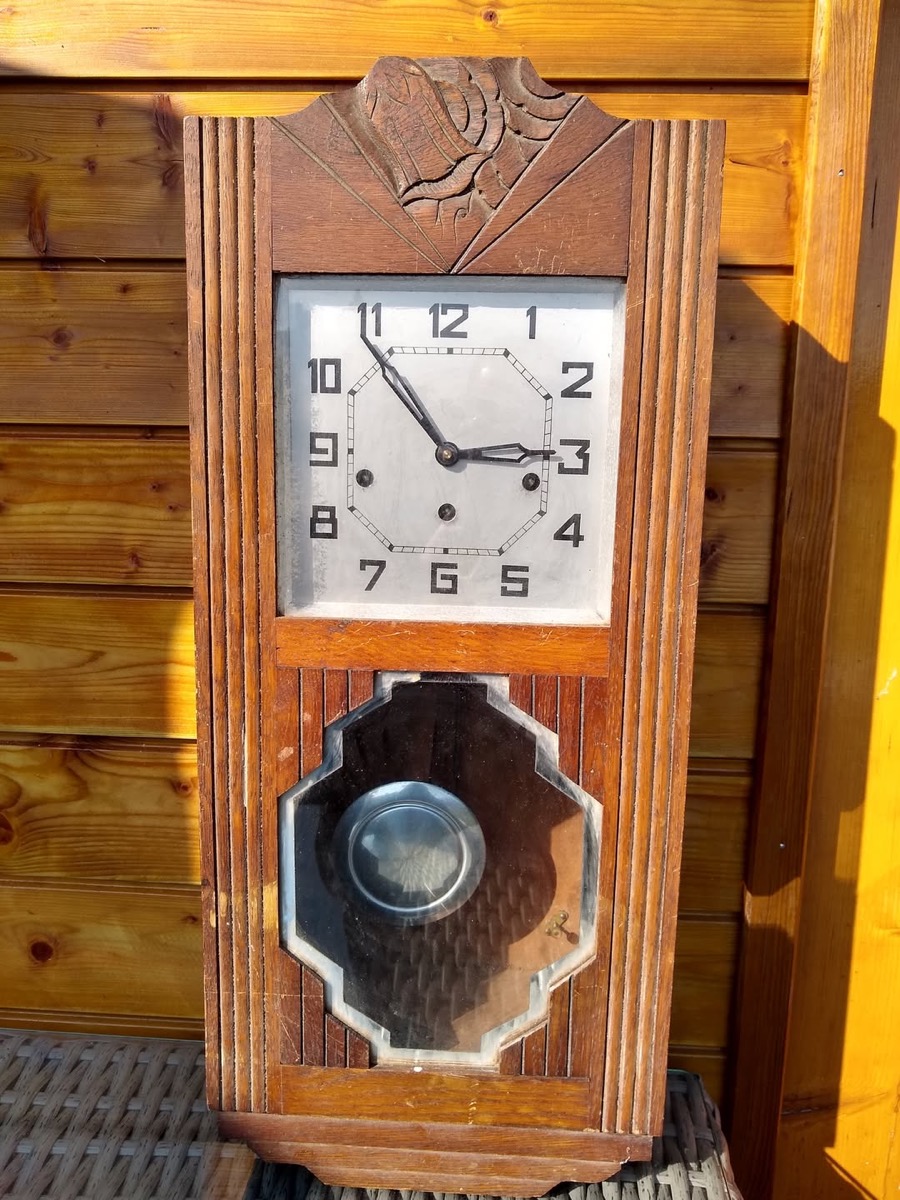 Antique pendulum wall clock