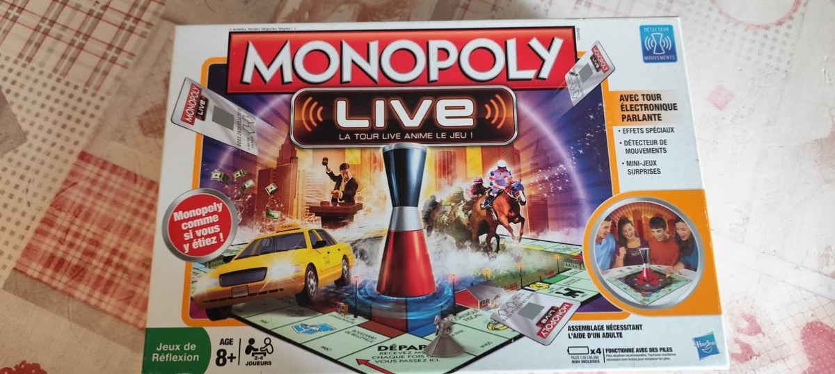 Board game, cot and a wall clock